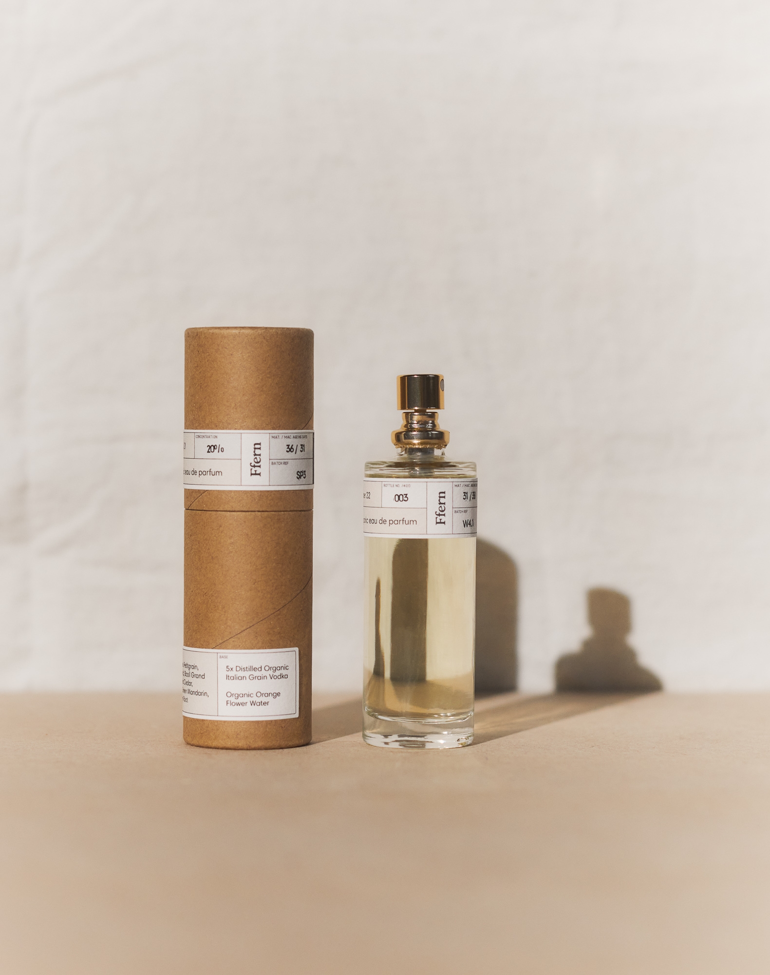 Ffern perfume bottle alongside ffern sustainable perfume tube